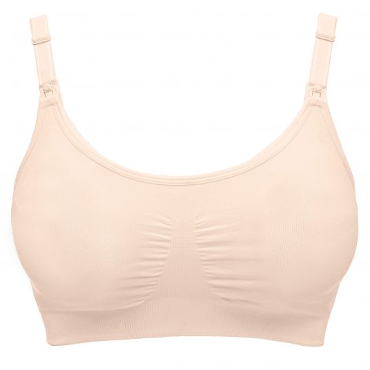 Medela's maternity and nursing bra in white for pregnancy and breastfeeding  available in S,M,L, XL