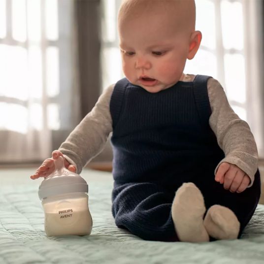 Philips Avent 6-tlg. Neugeborenen-Starter-Set Natural Response - 4 PP-Flaschen mit Silikon-Sauger + Schnuller Ultra Soft 0-6M + Flaschenbürste